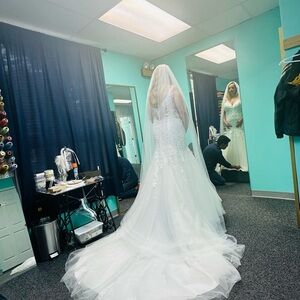Elegant White Wedding Gown with Veil